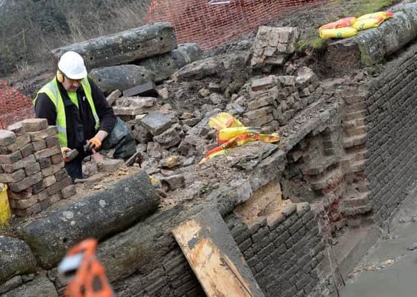 Repairs to a brick wall at Seabrook Lock near Cheddington