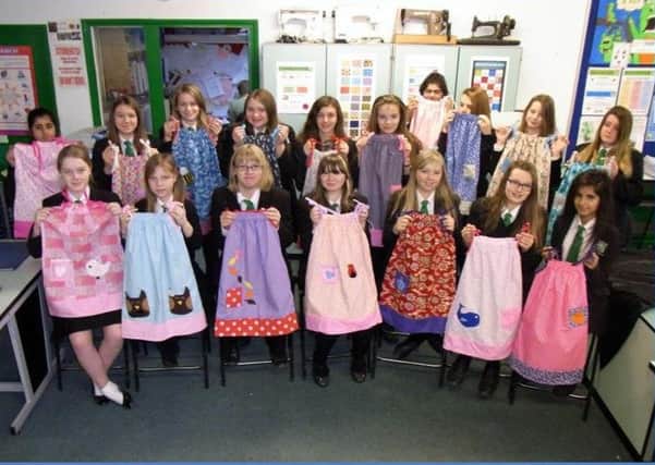 Princes Risborough School students with dresses for Kenya