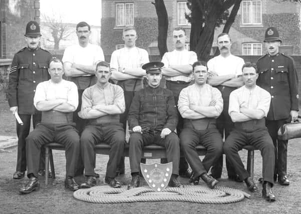 The teams from the Bucks Police tug of war event in 1921