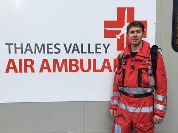 Doctor Ed Norris-Cervetto, a Registrar in Emergency & Prehospital Medicine at Oxford University Hospitals NHS Foundation Trust, models the live streaming camera equipment.