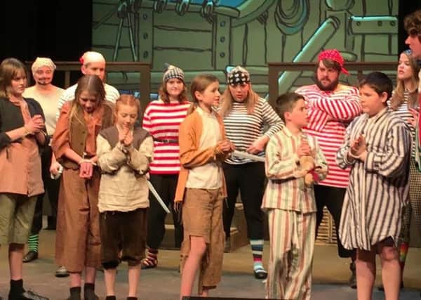 Thame Players new stage projection equipment is demonstrated during a production of Peter Pan