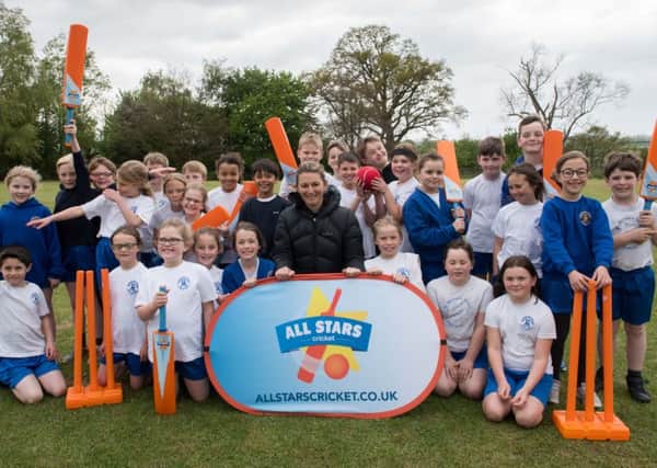 Former England womens cricket captain Charlotte Edwards coaches children at St Michael's School in Stewkley