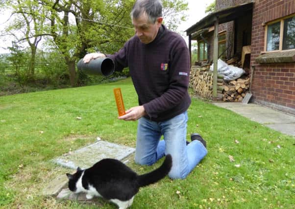 Measuring the rainfall - or lack of it. Picture Heather Jan Brunt