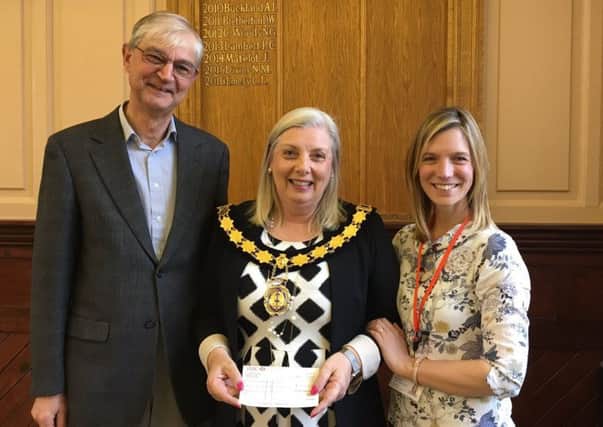RKFA cheque presentation by Mayor of Thame Linda Emery to John Hulett and Amy Spicer.