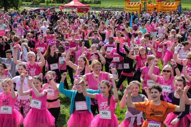 Runners warm up ahead of the 2017 Race for Life at Waddesdon Manor