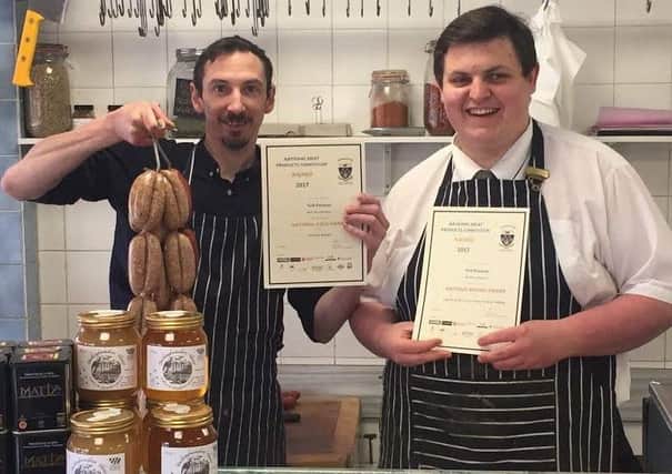 Neil Parsons (left) and Harry Sutchings with their butchers awards
