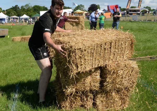 Buckingham Country Show. Euan Prime, Buckingham YFC in the Bale Stacking