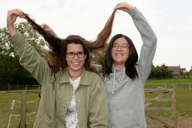 Aoife Finn, left, from Buckingham, is donating her hair for a wig for Megan Ponte  right, who has a sarcoma.