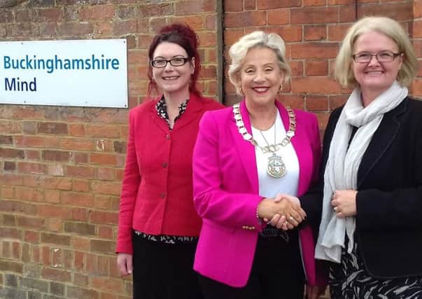 Chair of Aylesbury Vale District Council Sue Renshell with staff at Bucks Mind in Aylesbury - one of her chosen charities for the year
