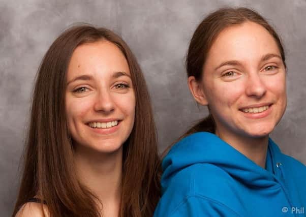 Twin sisters Heather Knight and Rachael Knight (right) are holding a pop-up restaurant night as part of their Borneo fundraising PNL-170125-143811001