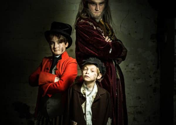 Riley Bettie as Artful Dodger, Connor Dyer as Fagin and Theo Collis as Oliver