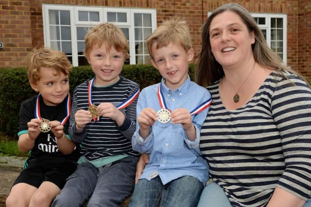 Finley Shudell, from Buckingham, ran a 10k to raise funds for The John Radcliffe Hospital after his mum, Emma Shudell was diagnosed with a brain tumour. From the left, Harry Palmer and Rowan Houston, Finley's friends who also ran, Finlay Shudell and Emma Shudell.