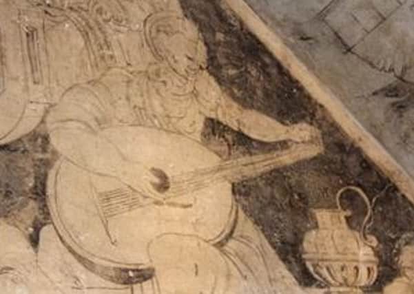 The Lady with the Lute - one of the Elizabethan wall paintings.