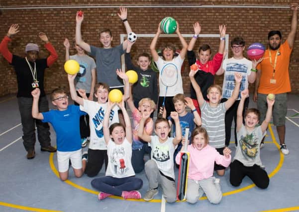 Summer sports at Buckingham Youth Centre - children take time out to pose with bats and balls for the cameras!