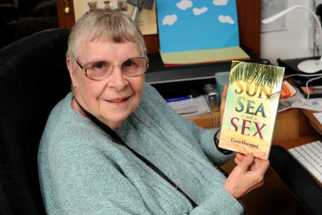 Author, Patricia Rudkin, from Great Horwood, with her first novel, Sun, Sea and Sex.