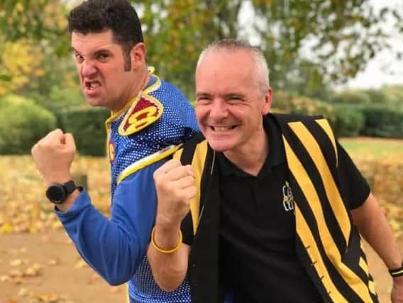 Colonel Custard (right) and Captain Calamity are aiming to break the pie-flinging world record at London's ExCel Centre